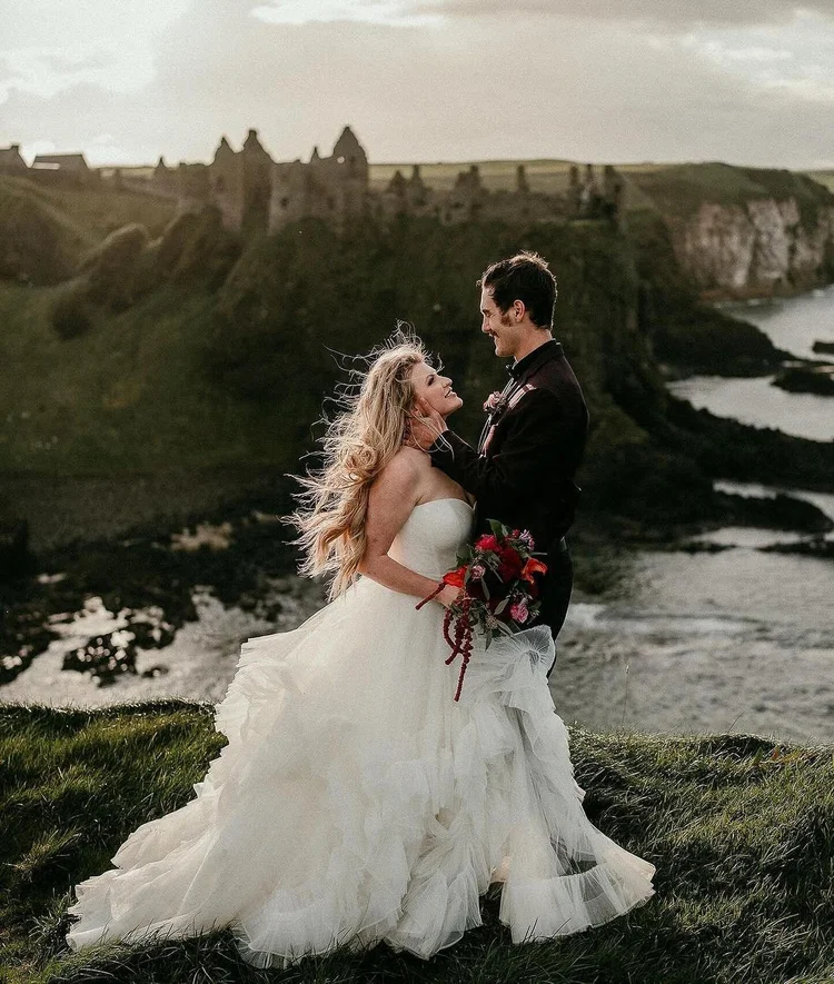 Dunluce Castle ruins at sunset